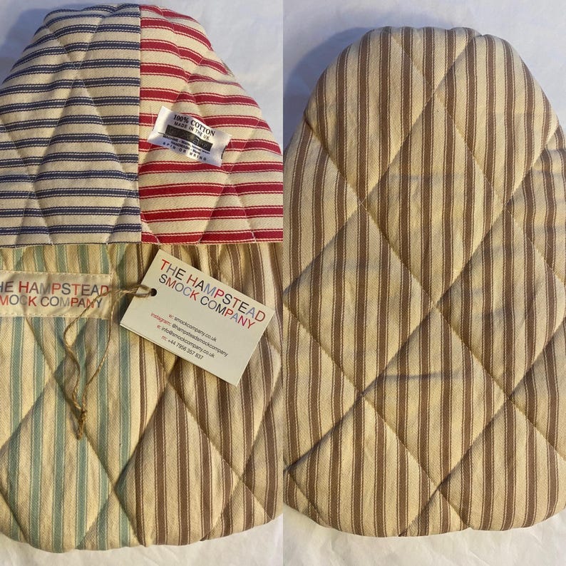 Pode incluir: Dois pegadores acolchoados com tecido listrado. Os pegadores s&atilde;o feitos de 100% algod&atilde;o e s&atilde;o feitos no Reino Unido. Os pegadores s&atilde;o da The Hampstead Smock Company.
