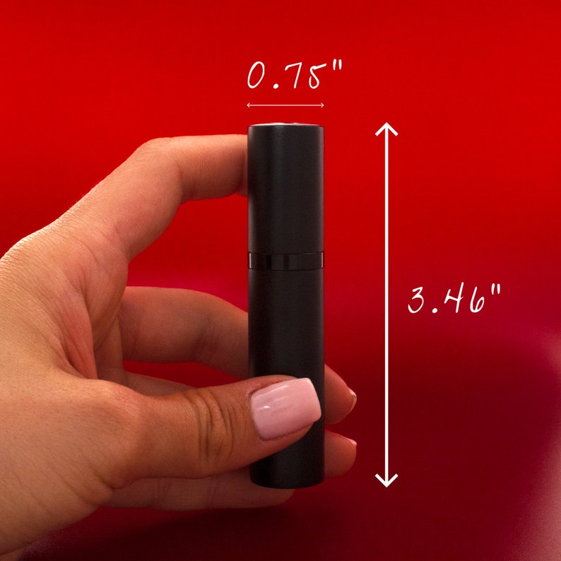 May include: A black refillable perfume atomizer bottle with a silver cap. The bottle is 3.46 inches tall and 0.75 inches wide.