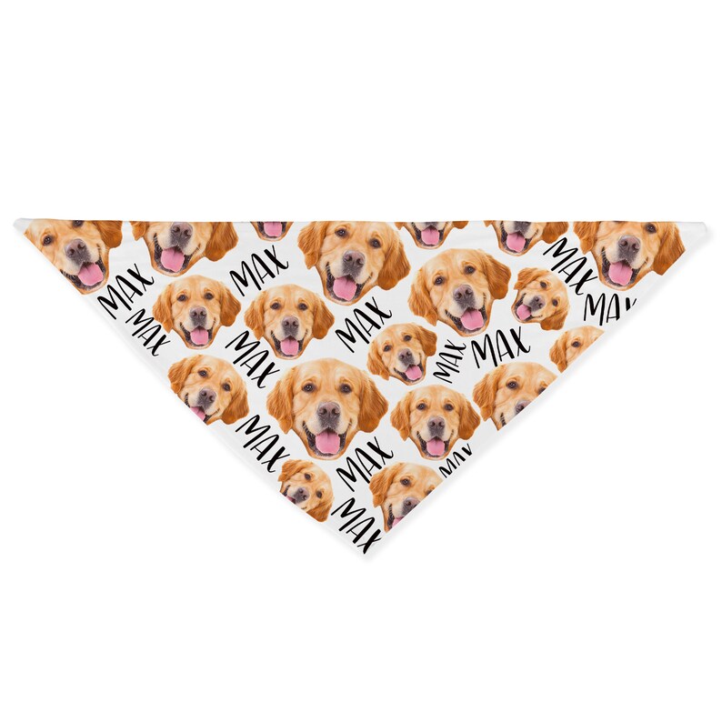 May include: White bandana with a repeating pattern of a golden retriever dog's face and the word "MAX" in black text.