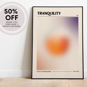 May include: A framed print with a blurred orange and purple design. The print is titled "Tranquility" and is part of the "State of Mind Series".