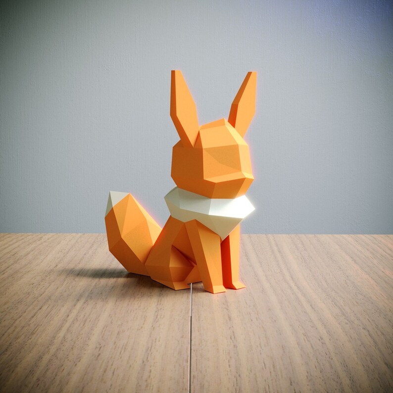 May include: Orange and white origami fox figurine sitting on a wooden surface.
