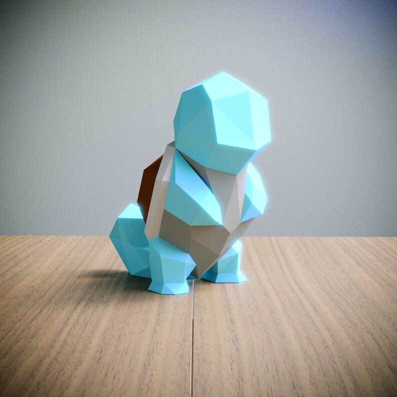 May include: A blue and gray origami sculpture of a cartoon character. The sculpture is made of folded paper and has a geometric design.