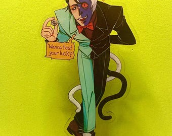May include: A two-toned character illustration with a cat-like appearance, wearing a suit and holding a coin. The character is split down the middle, with one side in teal and the other in black. Text on a sign reads "Wanna test your luck?"