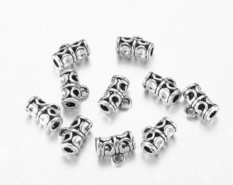 5 tube bail beads decorated in silver metal