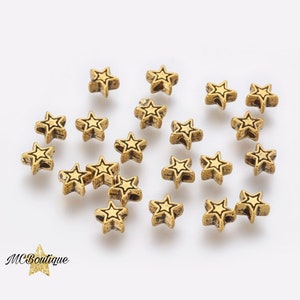 20, 50 gold metal star beads 6mm