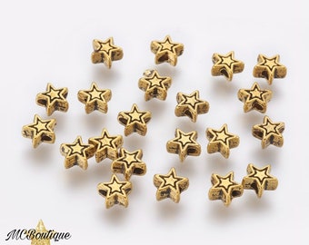 20, 50 gold metal star beads 6mm