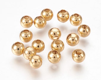 20 perles rondes acier inoxydable doré 4mm