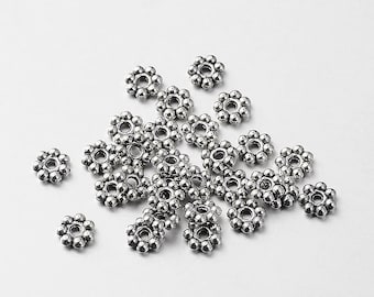 50 perles rondelles intercalaires fleur métal argenté 6mm