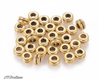 20, 50 double round spacer beads in gold metal 5x4mm