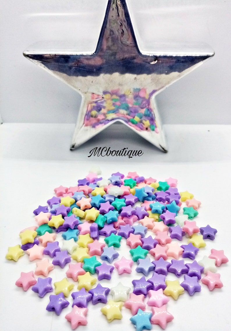 25, 100 star beads in multicolored acrylic 25, 100 star beads in multicolored acrylic