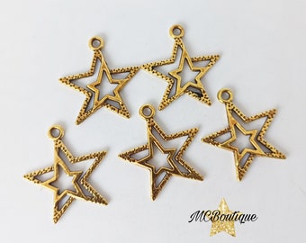 5 gold metal star charms 23mm