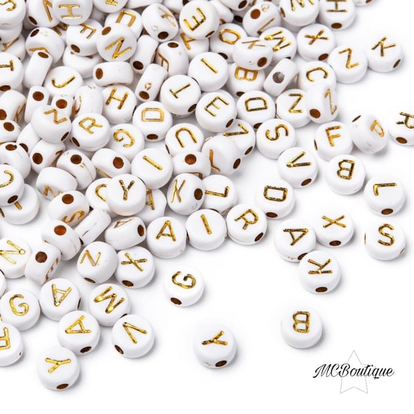 300 white Alphabet beads with golden writing 7mm