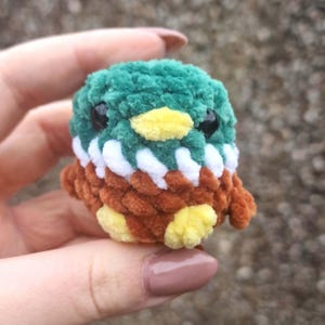 Front view of miniature crochet mallard duck plush toy
