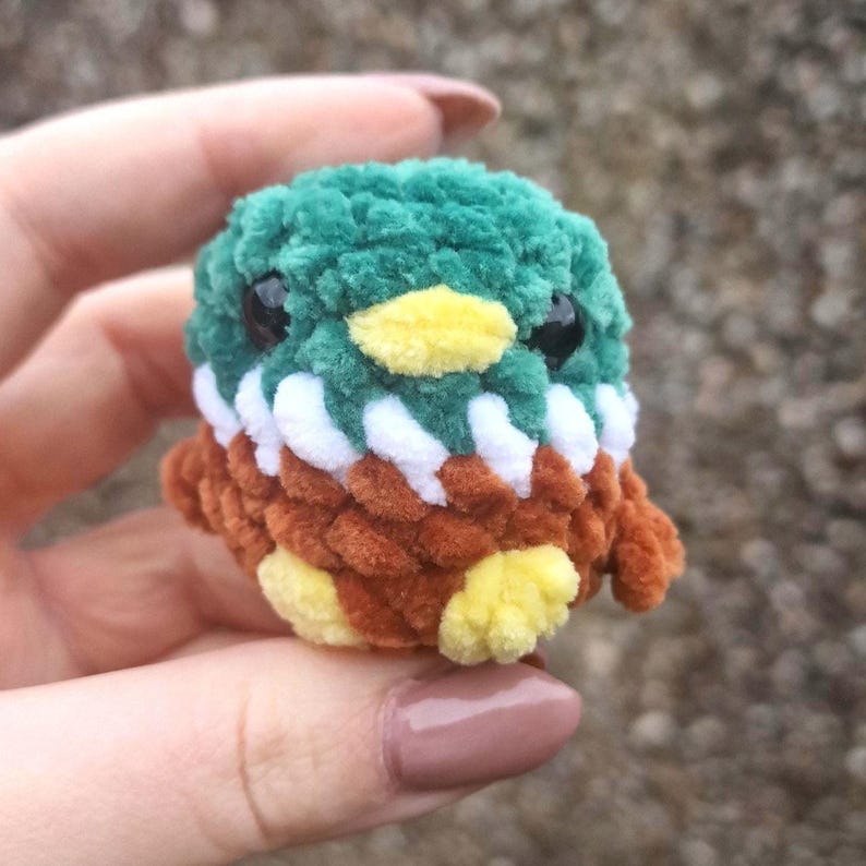 Front view of miniature crochet mallard duck plush toy