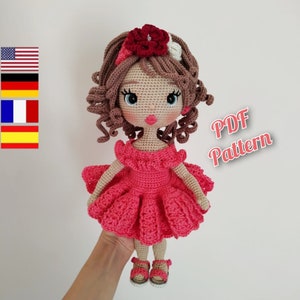 Crochet doll Astrid pattern 
This crochet pattern contains a detailed description with a lot of step-by-step photos of how to make a doll body, hairstyle, embroider the face, dress, shoes, ribbon and panties.
All clothes and shoes can be removed.