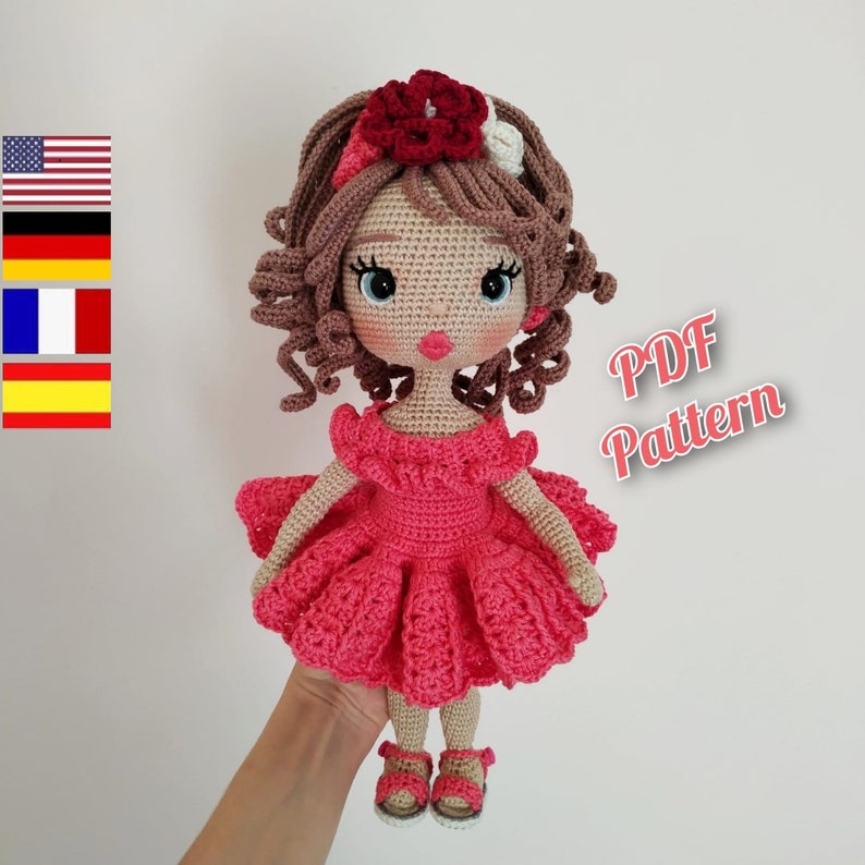 Crochet doll Astrid pattern 
This crochet pattern contains a detailed description with a lot of step-by-step photos of how to make a doll body, hairstyle, embroider the face, dress, shoes, ribbon and panties.
All clothes and shoes can be removed.