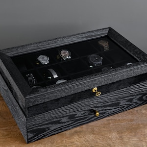 black oak watch box for 15 watch, lock and furry corner detail