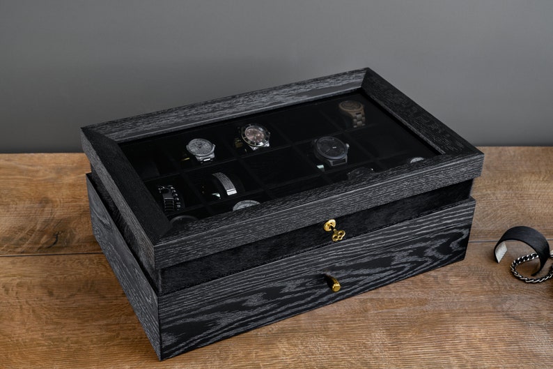 black oak watch box for 15 watch, lock and furry corner detail