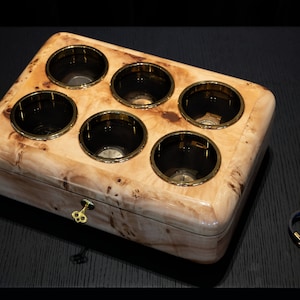 Mapa burl watch box with brown pillow