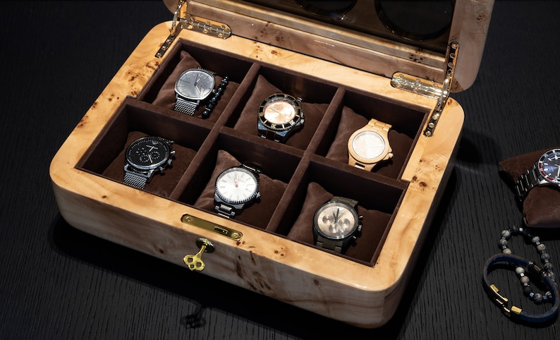 top view of mapa burl watch case, hinge, fabric and lock inside