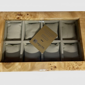 top view of handmade mapa burl watchbox for 8 watch