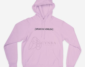 May include: A light pink hoodie with a black graphic that says "[SPEAKS NO N-ENGLISH]" and a logo that says "CYNBA STUDIOS".