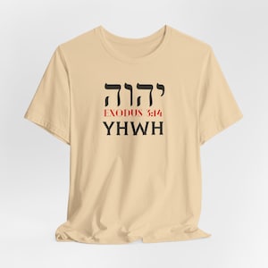May include: A beige t-shirt with black Hebrew lettering that reads "YHWH" and "EXODUS 3:14" in red.