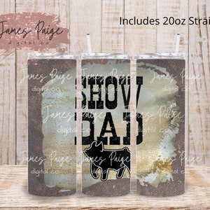 May include: A set of three 20 ounce tumblers with a rustic, distressed background. The center tumbler features the text "Show Dad" in black with a silhouette of a pig. The tumblers are designed for sublimation.