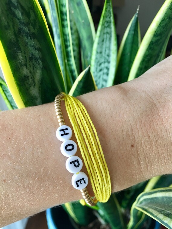 Amazon.com: 25 Childhood Cancer Gold Silicone Awareness Bracelets - Medical  Grade Silicone - Latex and Toxin Free - 25 Bracelets - Show Your Support  For Childhood Cancer Awareness : Clothing, Shoes & Jewelry