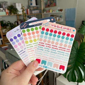 May include: Three sticker sheets with colorful circles and text. The sheets are labeled "Sweet monthly sticker sheet", "Sweetie Bean to the beach monthly sticker sheet", and "Sweetie Bean to the beach monthly sticker sheet".