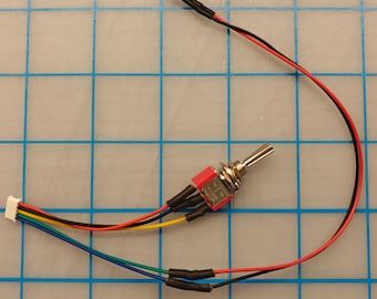 Interruptor plano y preciso con LED rojo de la película Trampa Fantasma de HASLAB. ¡Conéctalo y úsalo!