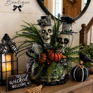 Halloween display, Mr.&Mrs, decorated Hats, glitter pumpkins, crystal eyes, silver spiders, quality greenery, handmade bow, candlestick base