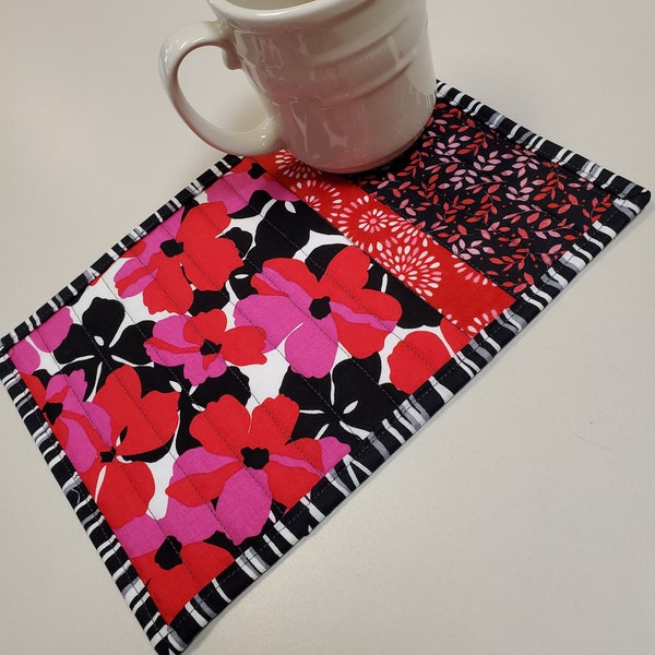 Quilted reversable mug rug, snack mat with red and pink flowers, black, gray and white stripe backing, miniture quilt