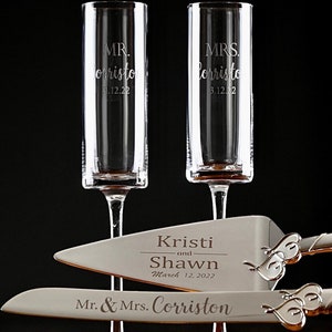 May include: A wedding cake serving set with two champagne flutes. The flutes are engraved with "MR. Corristo 3.12.22" and "MRS. Corristo 3.12.22". The cake knife is engraved with "Kristi and Shawn March 12, 2022" and "Mr. & Mrs. Corriston".