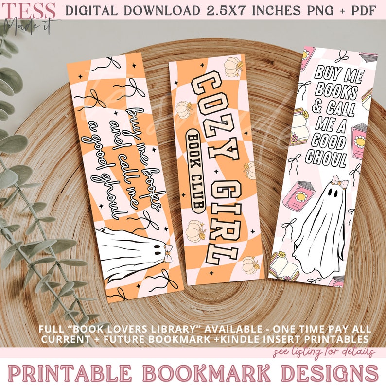 May include: Three printable bookmark designs featuring a ghost with a bow, a checkered background with pumpkins and the text "Cozy Girl Book Club", and a checkered background with pumpkins and the text "Buy me books and call me a good ghoul".