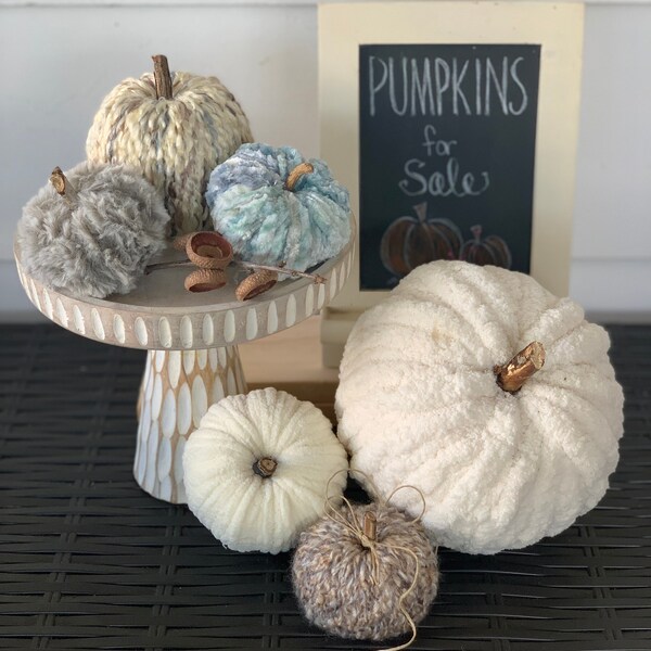 Chunky, yarn-wrapped pumpkins in harvest and coastal colors for fall decor