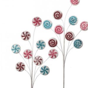 May include: A set of two white metal stems with multiple sparkly candy swirl ornaments. The ornaments are in shades of pink, blue, and burgundy.