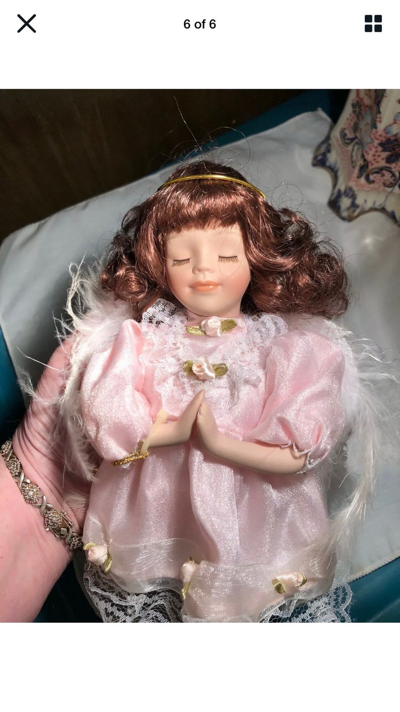porcelain dolls with angel wings