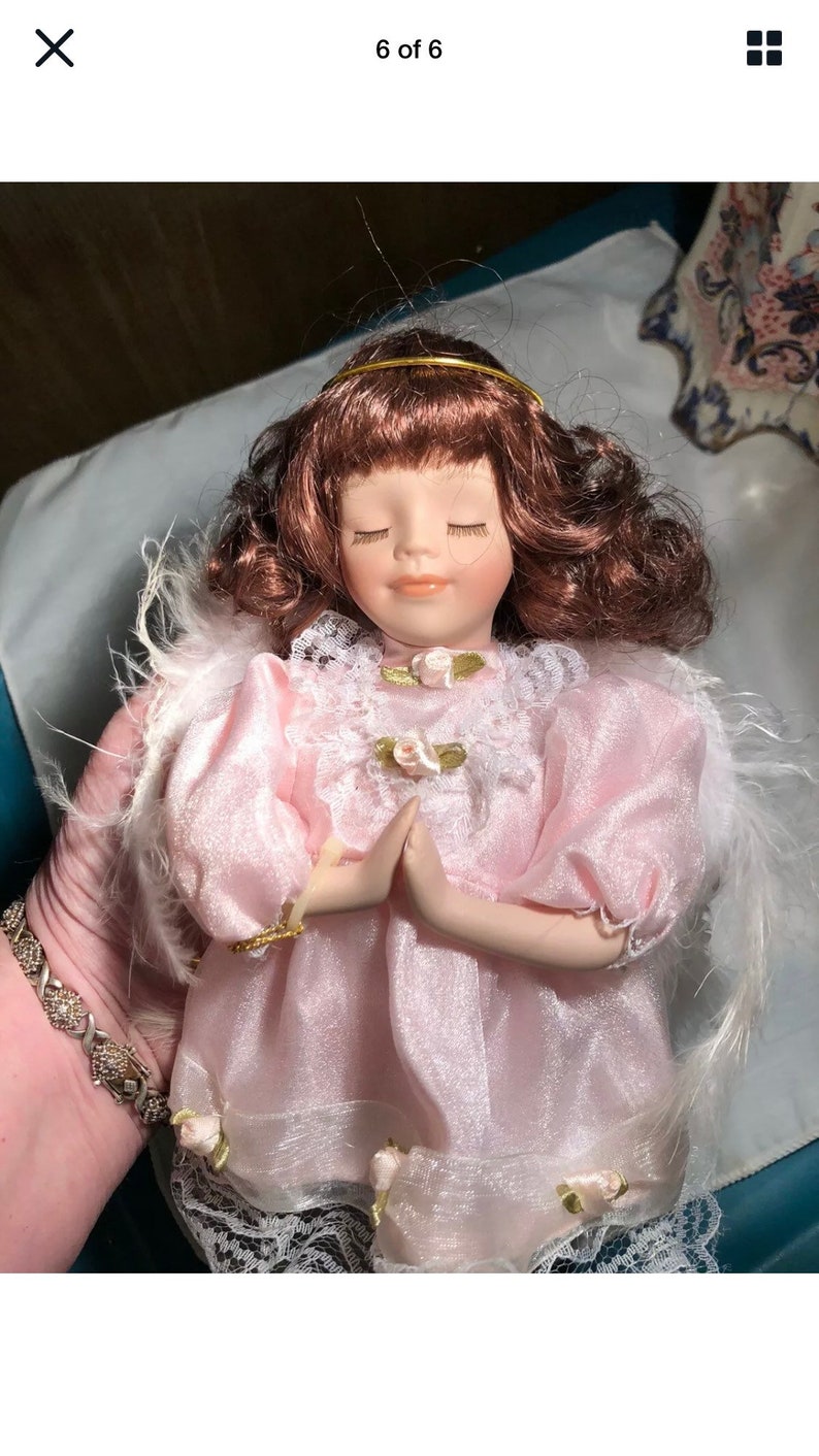 porcelain praying angel doll