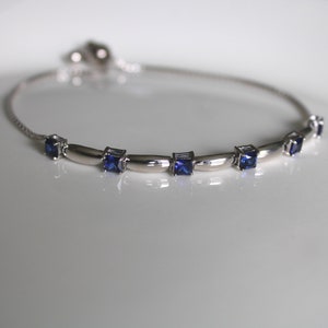 Sterling Silver Blue Sapphire Gemstone Pull Tie Bolo Bracelet, Elegant September Birthstone Adjustable Bolo Bracelet with Ball Clasp image 1