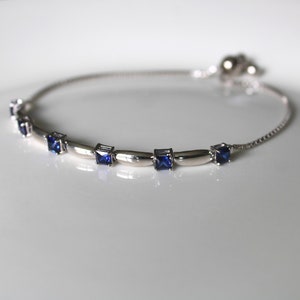 Sterling Silver Blue Sapphire Gemstone Pull Tie Bolo Bracelet, Elegant September Birthstone Adjustable Bolo Bracelet with Ball Clasp image 2