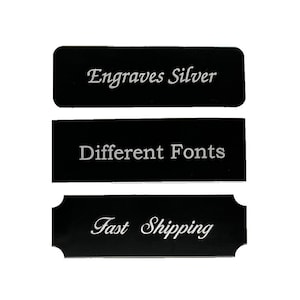 May include: Three black rectangular plaques with white text. The top plaque says "Engraves Silver". The middle plaque says "Different Fonts". The bottom plaque says "Fast Shipping".
