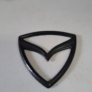 Mazda rotor shaped badge to suit rx-2, rx-3, rx-4, rx-7, rx-8, r100, cosmo, 13b, 20b, 26b