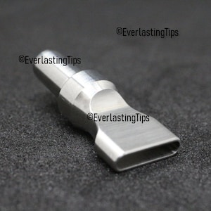 May include: A silver metal heat press tip with a rectangular opening. The tip is designed for use with a heat press machine.