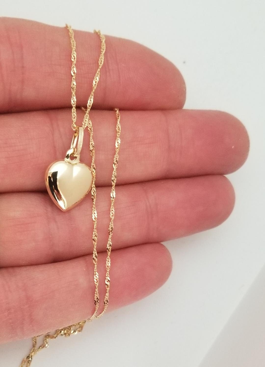 Plain gold heart best sale necklace