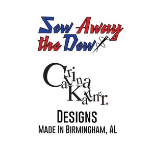May include: Sew Away the Dew logo in blue and red with a needle and thread design.  The text "Designs" is below the logo, followed by "Made in Birmingham, AL".  The name "Crina Katnr." is written in a stylized font.