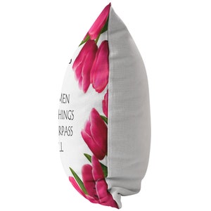 May include: White pillow with a pink floral design and the text "Sometimes the smallest things take up the most room in your heart".