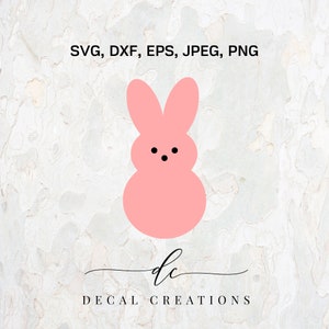 Puede incluir: Gráfico rosa con forma de conejito con ojos de puntos negros. La imagen incluye el texto "SVG, DXF, EPS, JPEG, PNG" en la parte superior y "dc DECAL CREATIONS" en la parte inferior en fuente cursiva.