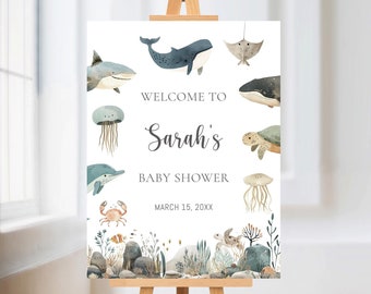 May include: Welcome to Sarah's Baby Shower sign featuring a watercolour illustration of sea creatures, including a whale, shark, jellyfish, dolphin, crab, and turtle. The sign also includes the date March 15, 20XX.