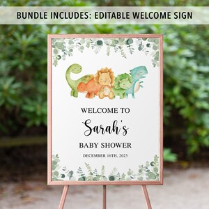 May include: A welcome sign for a baby shower with a green, white, and brown color scheme. The sign features a group of cartoon dinosaurs with a leafy border. The text on the sign reads "Welcome to Sarah's Baby Shower December 16th, 2023".